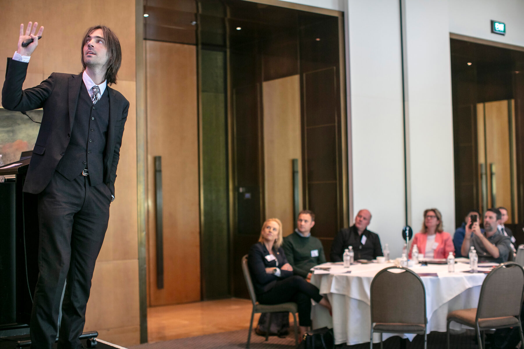 A speaker addressing participants at the Melbourne Forum